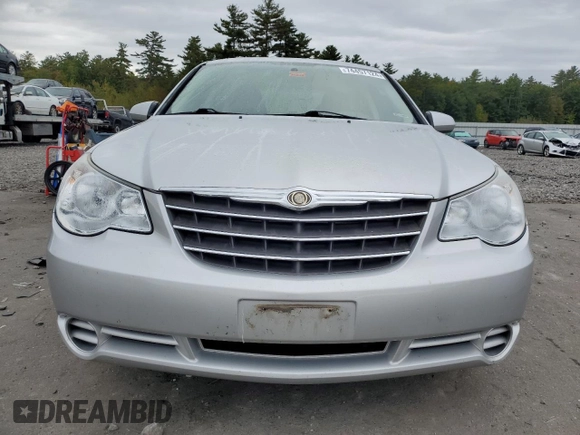 2010 Chrysler Sebring Limited with VIN 1C3CC5FD2AN194728, listed as a Copart auction lot 74457124 with 90,556 mi miles and Salvage title. Bid and sale history available at DreamBid. Image 5.