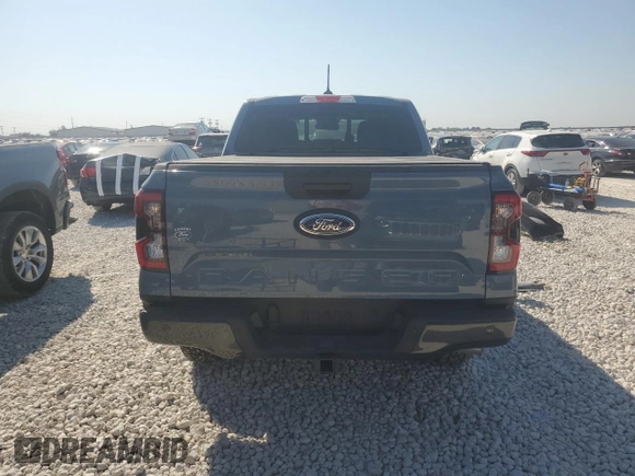 2024 Ford Ranger XLT with VIN 1FTER4GH9RLE15232, listed as a Copart auction lot 76024594 with 3,880 mi miles and Salvage Title. Bid and sale history available at carsss.com. Image 6.