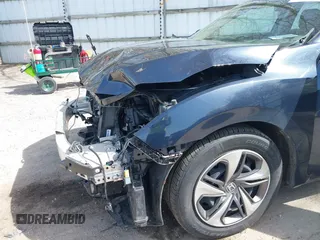 2021 Honda Civic LX z VIN 19XFC2F65ME000324, wystawiony jako IAAI lot #42137375 z przebiegiem 78 473 mil mil oraz . Historia ofert i sprzedaży dostępna na DreamBid. Obrazek 6.