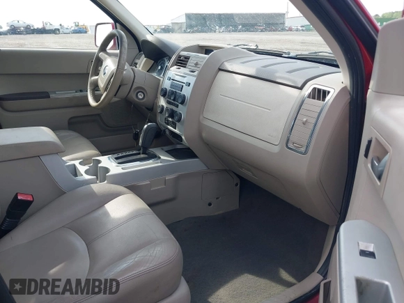 2008 Mercury Mariner Premier with VIN 4M2CU87158KJ12964, listed as a IAAI auction lot 42105891 with 202,194 mi miles and . Bid and sale history available at DreamBid. Image 5.