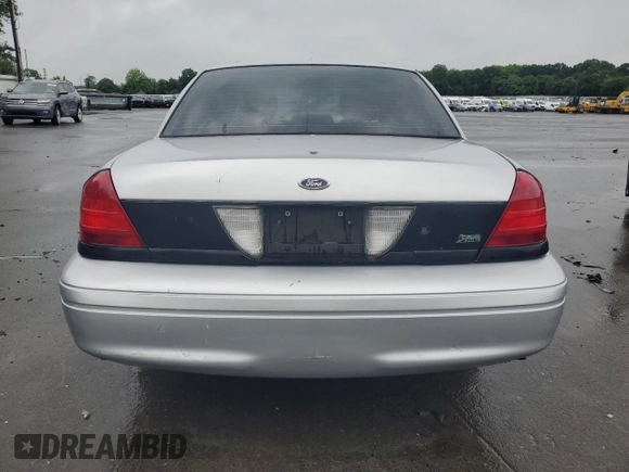 2011 Ford Police Interceptor with VIN 2FABP7BVXBX129914, listed as a Copart auction lot 59768295 with Not provided miles and Salvage title. Bid and sale history available at DreamBid. Image 6.