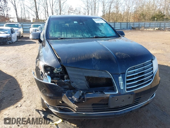 2018 Lincoln MKT with VIN 2LMHJ5NK5JBL02245, listed as a IAAI auction lot 41430571 with 293,537 mi miles and . Bid and sale history available at carsss.com. Image 6.