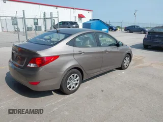 2013 Hyundai Accent GLS with VIN KMHCT4AE1DU358871, listed as a IAAI auction lot 42373080 with 150,443 mi miles and . Bid and sale history available at DreamBid. Image 4.