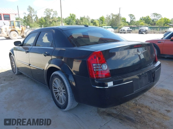 2009 Chrysler 300 Touring with VIN 2C3KA53V59H621936, listed as a IAAI auction lot 42112314 with 198,461 mi miles. Bid and sale history available at carsss.com. Image 3.