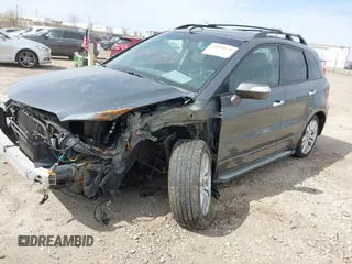 2012 Acura RDX with VIN 5J8TB1H21CA001175, listed as a IAAI auction lot 42038674 with 218,947 mi miles and . Bid and sale history available at carsss.com. Image 2.