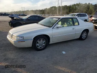 2000 Cadillac Eldorado z VIN 1G6EL12Y0YU182571, wystawiony jako Copart lot #82787594 z przebiegiem 193 219 mil mil oraz Czysty tytuł • Clean title. Historia ofert i sprzedaży dostępna na DreamBid. Obrazek 1.