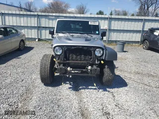 2015 Jeep Wrangler Unlimited Rubicon Hard Rock with VIN 1C4HJWFG2FL686556, listed as a Copart auction lot 54049955 with 126,675 mi miles and Salvage Title. Bid and sale history available at carsss.com. Image 5.