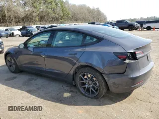 2023 Tesla Model 3 with VIN 5YJ3E1EA8PF699931, listed as a Copart auction lot 49293795 with 13,119 mi miles and Salvage Title. Bid and sale history available at DreamBid. Image 2.