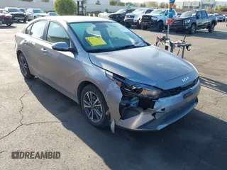 2023 Kia Forte LXS z VIN 3KPF24AD1PE558292, wystawiony jako IAAI lot #41937803 z przebiegiem 69 256 mil mil oraz . Historia ofert i sprzedaży dostępna na DreamBid. Obrazek 1.