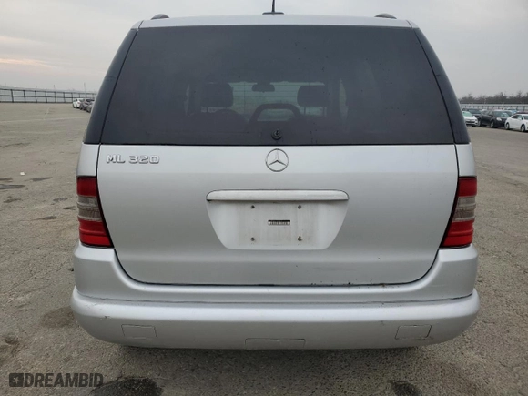 2001 Mercedes-Benz M-Class with VIN 4JGAB54E31A236148, listed as a Copart auction lot 41420905 with 163,120 mi miles and Clean Title. Bid and sale history available at carsss.com. Image 6.