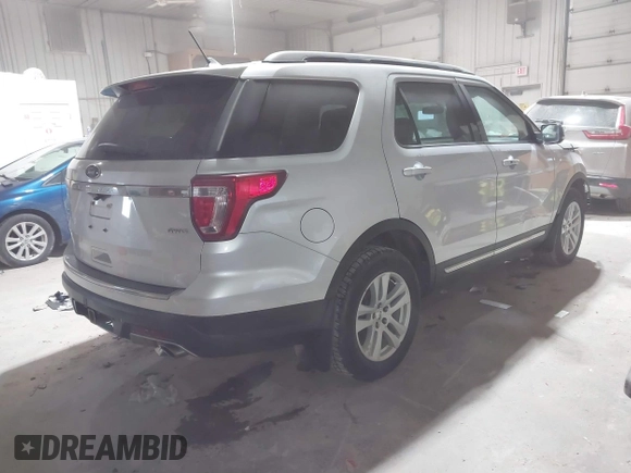 2018 Ford Explorer XLT z VIN 1FM5K8D8XJGA03930, wystawiony jako IAAI lot #41492266 z przebiegiem 160 362 mil mil oraz . Historia ofert i sprzedaży dostępna na DreamBid. Obrazek 4.