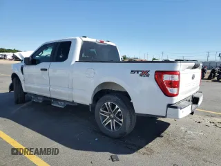 2021 Ford F-150 XL with VIN 1FTFX1E56MKD34057, listed as a Copart auction lot 63997585 with 99,679 mi miles and Clean title. Bid and sale history available at DreamBid. Image 2.