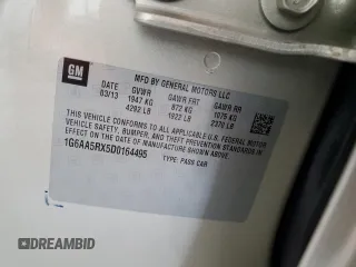 2013 Cadillac ATS z VIN 1G6AA5RX5D0164495, wystawiony jako Copart lot #55016525 z przebiegiem 83 243 mil mil oraz Szkoda całkowita • Salvage title. Historia ofert i sprzedaży dostępna na DreamBid. Obrazek 12.