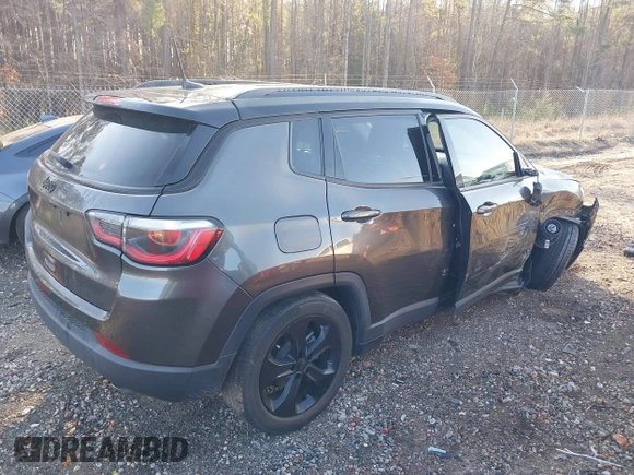 2020 Jeep Compass Latitude w/Sun/Safety Pkg with VIN 3C4NJCBB9LT236530, listed as a IAAI auction lot 41516261 with 67,158 mi miles. Bid and sale history available at carsss.com. Image 4.