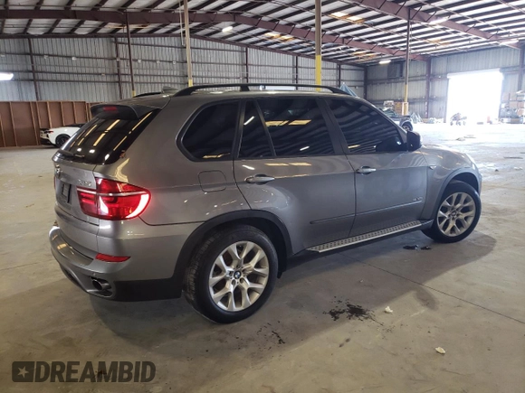 2012 BMW X5 35i z VIN 5UXZV4C5XCL767234, wystawiony jako Copart lot #64117285 z przebiegiem 187 969 mil mil oraz Czysty tytuł • Clean title. Historia ofert i sprzedaży dostępna na DreamBid. Obrazek 3.