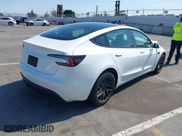 2025 Tesla Model 3 Long Range with VIN 5YJ3E1EA4SF903567, listed as a IAAI auction lot 42453246 with 19,365 mi miles and . Bid and sale history available at DreamBid. Image 4.