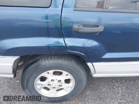2000 Jeep Grand Cherokee Laredo with VIN 1J4G248S4YC144404, listed as a IAAI auction lot 42114635 with 181,854 mi miles and . Bid and sale history available at DreamBid. Image 13.