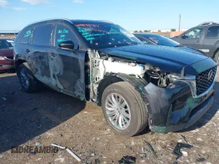 2024 Mazda CX-90 Select z VIN JM3KKAHD3R1165975, wystawiony jako IAAI lot #42086144 z przebiegiem 10 317 mil mil oraz . Historia ofert i sprzedaży dostępna na DreamBid. Obrazek 1.