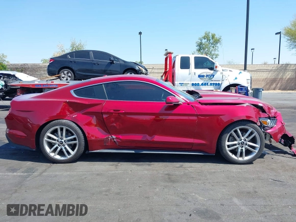 2016 Ford Mustang EcoBoost z VIN 1FA6P8THXG5252914, wystawiony jako IAAI lot #42184803 z przebiegiem 132 973 mil mil oraz . Historia ofert i sprzedaży dostępna na DreamBid. Obrazek 14.