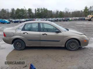 2003 Ford Focus LX with VIN 1FAFP33P33W267575, listed as a IAAI auction lot 41804406 with 106,957 mi miles and . Bid and sale history available at carsss.com. Image 13.