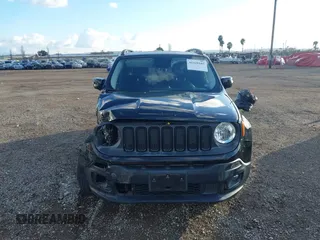 2017 Jeep Renegade Latitude with VIN ZACCJABB9HPE67907, listed as a IAAI auction lot 41425107 with 57,300 mi miles. Bid and sale history available at carsss.com. Image 12.