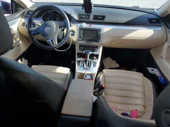 2009 Volkswagen CC Luxury with VIN WVWHL73C19E509071, listed as a Copart auction lot 65923464 with 128,841 mi miles and Salvage Title. Bid and sale history available at carsss.com. Image 8.