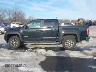 2015 GMC Canyon 4WD SLE z VIN 1GTG6BE31F1270675, wystawiony jako IAAI lot #41407183 z przebiegiem 143 117 mil mil oraz . Historia ofert i sprzedaży dostępna na DreamBid. Obrazek 14.