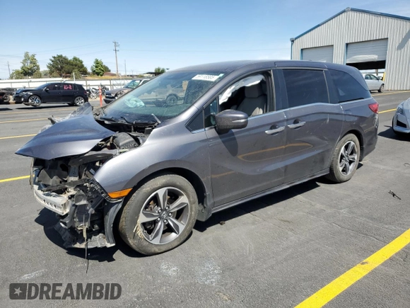 2020 Honda Odyssey Touring with VIN 5FNRL6H84LB032418, listed as a Copart auction lot 59118565 with Not provided miles and Salvage title. Bid and sale history available at DreamBid. Image 1.