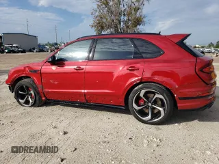2023 Bentley Bentayga z VIN SJAAT2ZV8PC021680, wystawiony jako Copart lot #39350374 z przebiegiem 2441 mil mil oraz . Historia ofert i sprzedaży dostępna na DreamBid. Obrazek 2.
