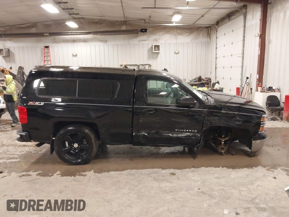 2015 Chevrolet Silverado 1500 LT with VIN 1GCNKREC7FZ176054, listed as a IAAI auction lot 41940955 with 197,857 mi miles and . Bid and sale history available at DreamBid. Image 13.