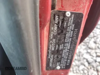1997 Hyundai Accent z VIN KMHVF24N5VU369924, wystawiony jako Copart lot #85036114 z przebiegiem 168 797 mil mil oraz Szkody całkowita. Historia ofert i sprzedaży dostępna na DreamBid. Obrazek 12.