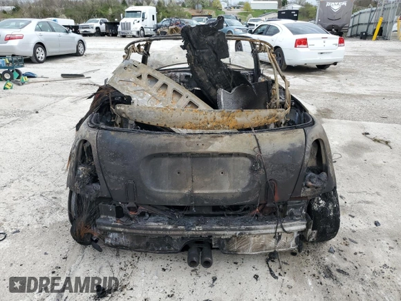 2006 MINI Convertible S with VIN WMWRH33536TK59031, listed as a Copart auction lot 51598825 with Not provided miles and Salvage title. Bid and sale history available at DreamBid. Image 6.