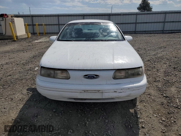 1993 Ford Taurus z VIN 1FALP5348PG189055, wystawiony jako Copart lot #58589175 z przebiegiem 45 421 mil mil oraz Tytuł czysty. Historia ofert i sprzedaży dostępna na DreamBid. Obrazek 5.