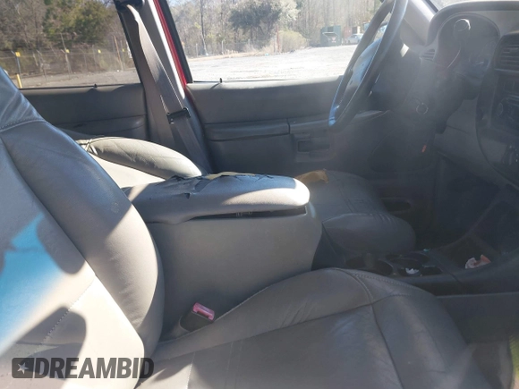 1999 Ford Explorer XLT z VIN 1FMZU32EXXZA25494, wystawiony jako IAAI lot #41659582 z przebiegiem 321 315 mil mil oraz . Historia ofert i sprzedaży dostępna na DreamBid. Obrazek 5.