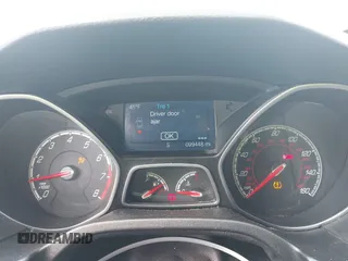 2014 Ford Focus ST z VIN 1FADP3L96EL413447, wystawiony jako IAAI lot #41887304 z przebiegiem 99 448 mil mil oraz . Historia ofert i sprzedaży dostępna na DreamBid. Obrazek 6.