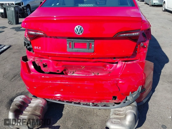 2019 Volkswagen Jetta GLI S z VIN 3VW5T7BU3KM225015, wystawiony jako IAAI lot #41352228 z przebiegiem 96 874 mil mil oraz . Historia ofert i sprzedaży dostępna na DreamBid. Obrazek 6.
