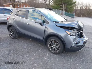 2019 Buick Encore Sport Touring with VIN KL4CJ1SB3KB962065, listed as a IAAI auction lot 41206207 with 59,618 mi miles. Bid and sale history available at carsss.com. Image 1.