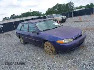 1997 Ford Escort LX z VIN 3FALP15P1VR145288, wystawiony jako IAAI lot #42463476 z przebiegiem 197 659 mil mil oraz . Historia ofert i sprzedaży dostępna na DreamBid. Obrazek 1.