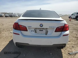 2013 BMW 5 Series 550i xDrive with VIN WBAFU9C52DDY71651, listed as a Copart auction lot 52156465 with 144,211 mi miles and Salvage title. Bid and sale history available at DreamBid. Image 6.