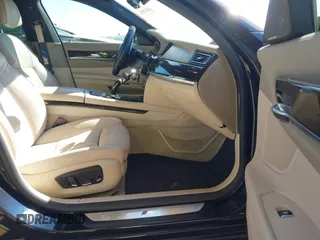 2014 BMW 7 Series ALPINA B7 with VIN WBAYE8C58ED135475, listed as a IAAI auction lot 41417075 with 102,364 mi miles. Bid and sale history available at carsss.com. Image 5.