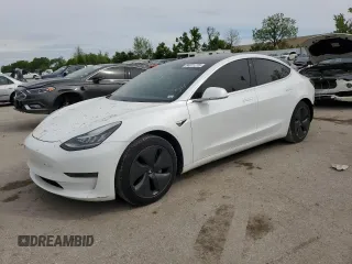 2020 Tesla Model 3 Standard Range Plus z VIN 5YJ3E1EA9LF797330, wystawiony jako Copart lot #54871775 z przebiegiem 38 016 mil mil oraz Szkoda całkowita • Salvage title. Historia ofert i sprzedaży dostępna na DreamBid. Obrazek 1.