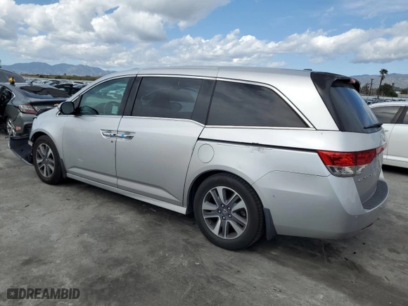 2015 Honda Odyssey Touring Elite with VIN 5FNRL5H90FB114508, listed as a Copart auction lot 51290945 with 112,330 mi miles and Salvage Title. Bid and sale history available at carsss.com. Image 2.