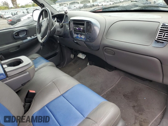 2002 Ford F-150 с VIN 1FTPX17L02NA71656, выставлен на аукционе Copart как лот 49182185 с пробегом 49 745 миль миль и Списание • Salvage title. История ставок и продаж доступна на DreamBid. Изображение 8.