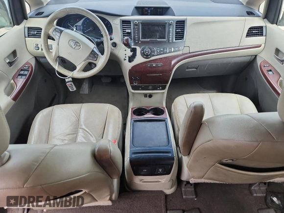 2011 Toyota Sienna XLE AAS с VIN 5TDYK3DC1BS017540, выставлен на аукционе Copart как лот 65177255 с пробегом 164 604 миль миль и Списание • Salvage title. История ставок и продаж доступна на DreamBid. Изображение 8.