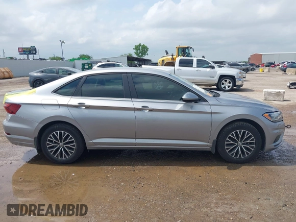 2021 Volkswagen Jetta S z VIN 3VWC57BU4MM094780, wystawiony jako IAAI lot #42103554 z przebiegiem 49 044 mil mil oraz . Historia ofert i sprzedaży dostępna na DreamBid. Obrazek 13.
