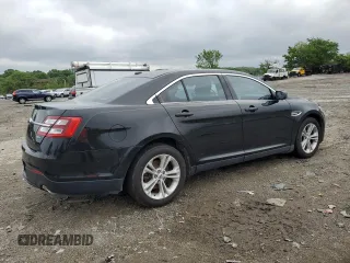 2014 Ford Taurus SEL z VIN 1FAHP2E85EG184686, wystawiony jako Copart lot #55862775 z przebiegiem 238 217 mil mil oraz Czysty tytuł • Clean title. Historia ofert i sprzedaży dostępna na DreamBid. Obrazek 3.