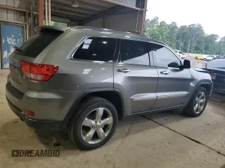 2013 Jeep Grand Cherokee Overland with VIN 1C4RJECT6DC526032, listed as a Copart auction lot 55660905 with 97,406 mi miles and Salvage Title. Bid and sale history available at DreamBid. Image 3.