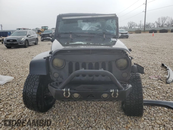 2017 Jeep Wrangler Willys Wheeler with VIN 1C4AJWAG9HL673766, listed as a Copart auction lot 43132555 with 129,422 mi miles and Salvage Title. Bid and sale history available at DreamBid. Image 5.