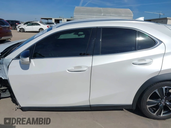 2021 Lexus UX with VIN JTHX3JBH5M2034944, listed as a IAAI auction lot 41068335 with 53,522 mi miles. Bid and sale history available at carsss.com. Image 14.