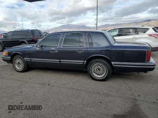 1994 Lincoln Town Car Signature z VIN 1LNLM82W6RY705395, wystawiony jako Copart lot #82490554 z przebiegiem 252 997 mil mil oraz Szkoda całkowita • Salvage title. Historia ofert i sprzedaży dostępna na DreamBid. Obrazek 2.